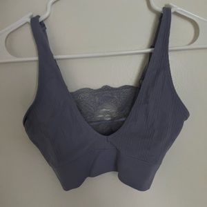 cropped tank top. lace in the back and adjustable straps